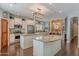 Spacious kitchen with granite countertops and stainless steel appliances at 2969 E Trigger Way, Gilbert, AZ 85297
