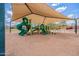 Shaded playground with slides, climbing structures, and play areas for children in a community park at 2969 E Trigger Way, Gilbert, AZ 85297