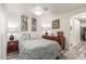 Comfortable bedroom with elegant decor, soft lighting, and ample storage, designed for restful nights at 29972 N Bryce Trl, San Tan Valley, AZ 85144