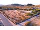 Expansive, undeveloped land perfect for building, featuring natural desert vegetation and mountain views at 29972 N Bryce Trl, San Tan Valley, AZ 85144