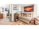 Cozy living room with comfortable seating, neutral decor, and a doorway leading to another room at 29972 N Bryce Trl, San Tan Valley, AZ 85144
