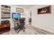 Bright office space with modern desk setup, comfortable chair, and calming artwork, ideal for productivity at 29972 N Bryce Trl, San Tan Valley, AZ 85144
