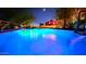 Sparkling pool at night with colorful lighting at 29972 N Bryce Trl, San Tan Valley, AZ 85144