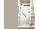 Tiled shower with handheld shower head and grab bar for accessibility at 29972 N Bryce Trl, San Tan Valley, AZ 85144