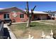 Street view of a one story home with a well manicured lawn, desert landscaping and a one car garage at 3020 N 64Th Dr, Phoenix, AZ 85033