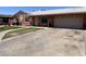 Charming single story home with a well manicured lawn, spacious driveway, and a one car garage at 3020 N 64Th Dr, Phoenix, AZ 85033