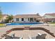 Backyard showcasing a pool with brick trim, patio, and seating area, perfect for outdoor entertaining at 3528 N Crystal Ln, Avondale, AZ 85392