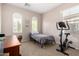 Cozy bedroom featuring two bright windows at 37852 W Merced St, Maricopa, AZ 85138