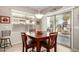 Inviting dining area with natural light and sliding glass doors leading to an outdoor patio at 37852 W Merced St, Maricopa, AZ 85138