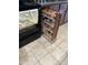 Convenient pull-out spice rack cabinet sits adjacent to the oven at 37852 W Merced St, Maricopa, AZ 85138