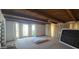 Bright bedroom with wood beamed ceiling, ceiling fan, and large windows with lots of natural light at 4242 W Sandra Ter, Phoenix, AZ 85053
