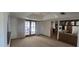Dining area features a chandelier, French doors and kitchen access, ideal for entertaining at 4242 W Sandra Ter, Phoenix, AZ 85053