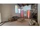 Spacious living room features a stone fireplace, ceiling fan, and natural light at 4242 W Sandra Ter, Phoenix, AZ 85053