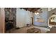 Large living room with a stone fireplace, wood ceiling, and open layout at 4242 W Sandra Ter, Phoenix, AZ 85053