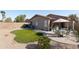 Backyard with desert landscaping, patio, and fencing, perfect for low-maintenance outdoor living at 42430 W Oakland Dr, Maricopa, AZ 85138