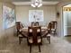 Comfortable dining room featuring a round table, six chairs, and stylish wall decor at 425 S Parkcrest -- # 335, Mesa, AZ 85206