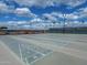 Community shuffleboard area featuring well-maintained courts and perimeter seating at 425 S Parkcrest -- # 335, Mesa, AZ 85206