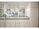 Bathroom featuring a double sink vanity with granite countertops and recessed lighting above at 4303 E Cactus S Rd # 229, Phoenix, AZ 85032