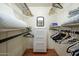 Organized walk-in closet with shelving, drawers, and ample storage solutions at 4303 E Cactus S Rd # 229, Phoenix, AZ 85032