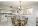 Charming dining area adjacent to the modern kitchen with lots of natural light at 4303 E Cactus S Rd # 229, Phoenix, AZ 85032