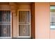 Secured entrance with decorative metal doors and a modern keyless entry system at 4303 E Cactus S Rd # 229, Phoenix, AZ 85032