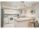 Well-lit kitchen with stainless steel appliances and granite countertops at 4303 E Cactus S Rd # 229, Phoenix, AZ 85032