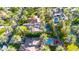 Stunning aerial view of luxury homes with private pools surrounded by lush palm tree landscaping at 4420 N 47Th Pl, Phoenix, AZ 85018