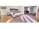 Cozy bedroom featuring a plush bed, hardwood floors, and soft natural lighting at 4420 N 47Th Pl, Phoenix, AZ 85018