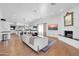 Open concept layout seamlessly connects the kitchen, dining, and living areas, perfect for modern living and entertaining at 4420 N 47Th Pl, Phoenix, AZ 85018