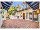 Inviting outdoor patio with a brick surface and built-in grill, providing a cozy space for outdoor cooking and dining at 4420 N 47Th Pl, Phoenix, AZ 85018