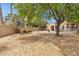 Spacious backyard with desert landscaping and mature shade trees at 5 W Ranch Rd, Tempe, AZ 85284