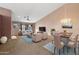 Bright living room with vaulted ceiling and dining area with stylish chandelier and comfortable seating at 5 W Ranch Rd, Tempe, AZ 85284