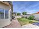 Backyard with green grass, patio and exterior BBQ - perfect for entertaining at 515 S Apache Dr, Chandler, AZ 85224