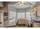 Bright kitchen with stainless steel appliances, light wood cabinets, and a window over the sink at 515 S Apache Dr, Chandler, AZ 85224