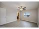 Spacious main bedroom featuring tile floors, ample natural light, and an en-suite bathroom at 6120 W Keim Dr, Glendale, AZ 85301