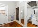 Practical bathroom with shower, toilet, sink, and door to the outside at 711 E Mckinley St, Phoenix, AZ 85006