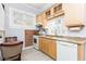 Well-lit kitchen featuring granite countertops and stainless steel appliances at 711 E Mckinley St, Phoenix, AZ 85006