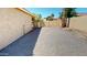 Spacious gravel backyard for easy maintenance and flexible use at 7730 E Boise St, Mesa, AZ 85207