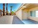 Spacious gravel backyard with covered patio, offering a low-maintenance outdoor space at 7730 E Boise St, Mesa, AZ 85207