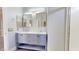 Bathroom with double vanity, gray cabinets, marble counters, and modern light fixtures at 7730 E Boise St, Mesa, AZ 85207