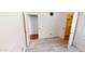 Spacious bedroom with wood-look floors, and walk-in closet at 7730 E Boise St, Mesa, AZ 85207