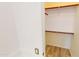 Walk-in closet with shelving and hanging space for storage at 7730 E Boise St, Mesa, AZ 85207