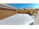 Long driveway leading up to garage, with side access gate to rear of property at 7730 E Boise St, Mesa, AZ 85207