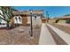 Charming single-Gathering home with well maintained desert landscaping and a private driveway at 7730 E Boise St, Mesa, AZ 85207