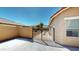 Wrought iron driveway gate adds security and curb appeal to this beautiful home at 7730 E Boise St, Mesa, AZ 85207