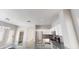 Well-equipped kitchen with stainless steel appliances and granite counters and a center island at 7730 E Boise St, Mesa, AZ 85207
