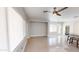 Bright living room with modern lighting and tile flooring at 7730 E Boise St, Mesa, AZ 85207