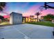 Basketball court view of home with backyard pool and palm trees at 12809 N 67Th St, Scottsdale, AZ 85254
