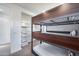 Bedroom with bunk beds and a view to the pantry, providing practical sleeping arrangements at 12809 N 67Th St, Scottsdale, AZ 85254