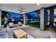 Charming covered patio providing a cool breeze, comfortable seating, and a view of the backyard pool at 12809 N 67Th St, Scottsdale, AZ 85254